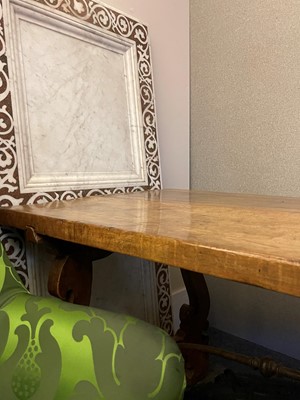 Lot 49 - A walnut and wrought iron table