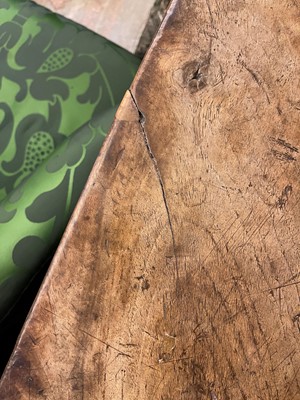 Lot 49 - A walnut and wrought iron table