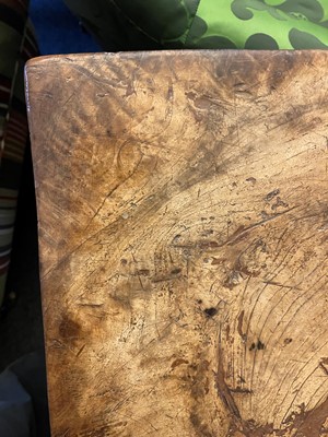 Lot 49 - A walnut and wrought iron table