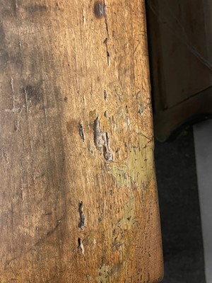 Lot 49 - A walnut and wrought iron table