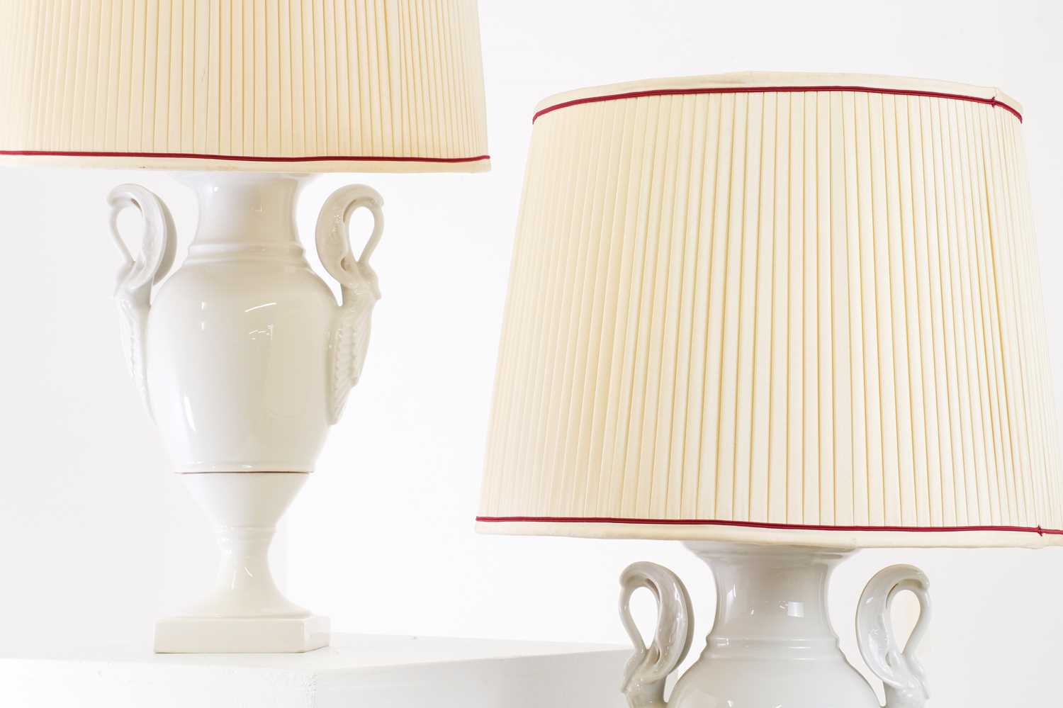 Lot 69 - A pair of Limoges blanc de Chine table lamps