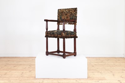 Lot 74 - A walnut open armchair