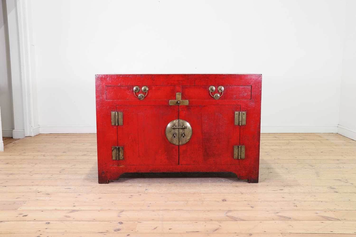 Lot 4 - A red-lacquered elm side cabinet