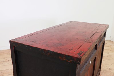 Lot 4 - A red-lacquered elm side cabinet