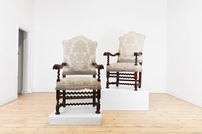 Lot 1 - A pair of large walnut open armchairs