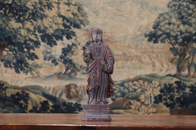 Lot 14 - A group of carved and polychrome-painted wooden saints