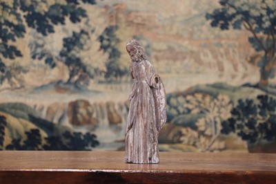 Lot 14 - A group of carved and polychrome-painted wooden saints
