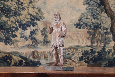 Lot 14 - A group of carved and polychrome-painted wooden saints