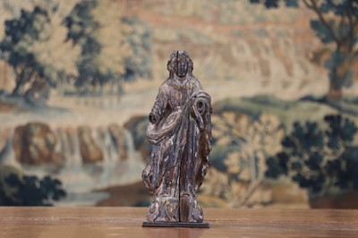 Lot 14 - A group of carved and polychrome-painted wooden saints