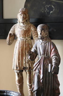 Lot 14 - A group of carved and polychrome-painted wooden saints