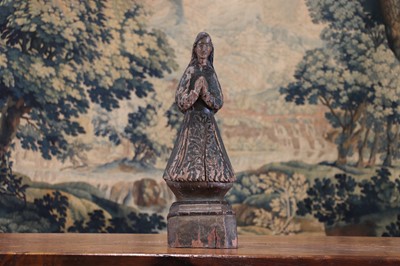 Lot 14 - A group of carved and polychrome-painted wooden saints
