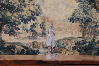 Lot 14 - A group of carved and polychrome-painted wooden saints