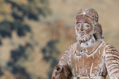 Lot 14 - A group of carved and polychrome-painted wooden saints