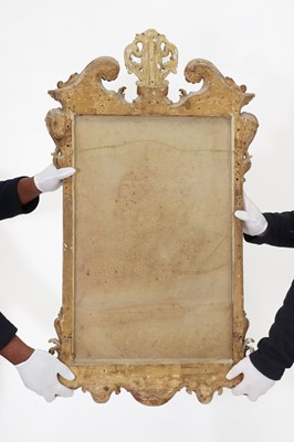 Lot 29 - A George II carved giltwood and gesso pier mirror