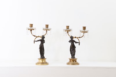 Lot 31 - A pair of Empire-style gilt and patinated bronze candelabra