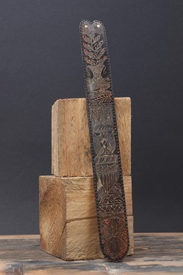 Lot 485 - A carved baleen whalebone corset stay busk
