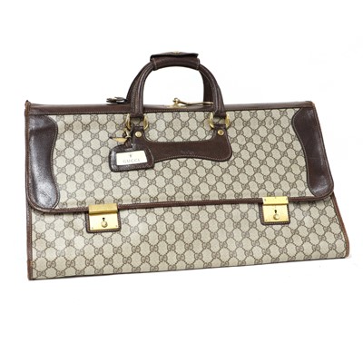 Lot 339 - A vintage Gucci coated canvas and leather suit holder