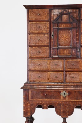 Lot 351 - A yew wood and walnut cabinet on stand