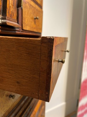Lot 351 - A yew wood and walnut cabinet on stand