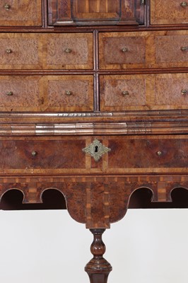 Lot 351 - A yew wood and walnut cabinet on stand