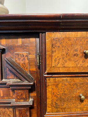Lot 351 - A yew wood and walnut cabinet on stand