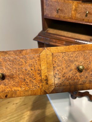 Lot 351 - A yew wood and walnut cabinet on stand