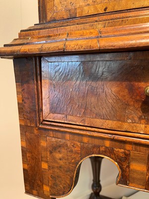 Lot 351 - A yew wood and walnut cabinet on stand