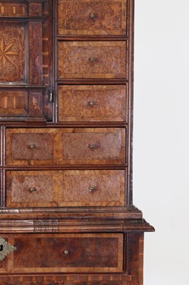 Lot 351 - A yew wood and walnut cabinet on stand