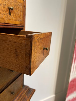 Lot 351 - A yew wood and walnut cabinet on stand