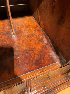 Lot 351 - A yew wood and walnut cabinet on stand