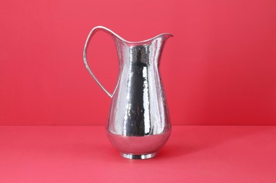 Lot 228 - A silver water jug