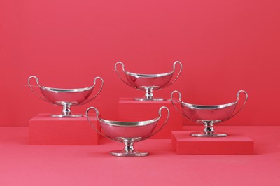 Lot 232 - A set of four George III silver boat-shaped salts