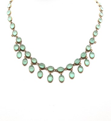 Lot 8 - A Georgian gilt metal green paste fringed necklace