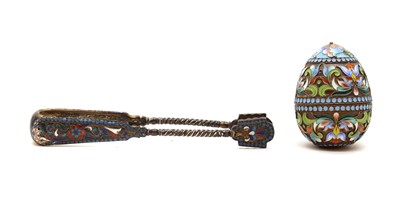 Lot 16 - A Russian style silver gilt and enamel egg