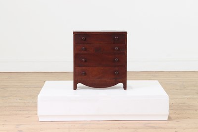 Lot 91 - A George III miniature chest of drawers