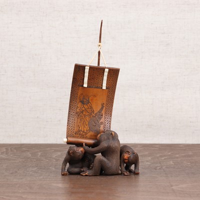 Lot 307 - A Japanese boxwood and ivory okimono