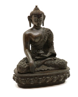 Lot 78 - A Chinese bronze Buddha