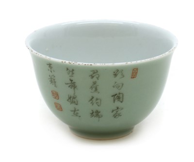 Lot 80 - A Chinese celadon glazed tea bowl