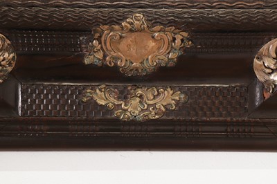 Lot 106 - An ebonised fruitwood mirror