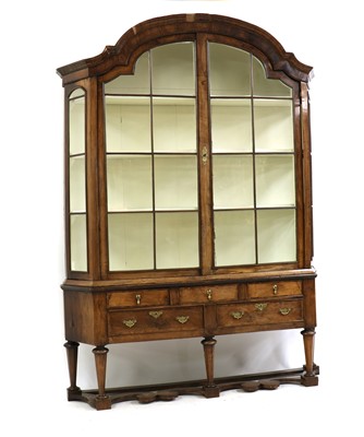 Lot 306 - A walnut display cabinet