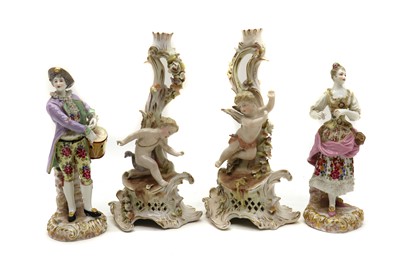 Lot 133 - A pair of Sitzendorf porcelain candlesticks