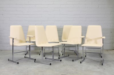 Lot 453 - A set of eight leather and chrome dining chairs