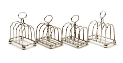 Lot 19 - A Victorian silver four division toast rack