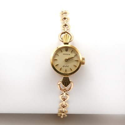Lot 548 - A ladies' 18ct gold Rolex Orchid mechanical strap watch