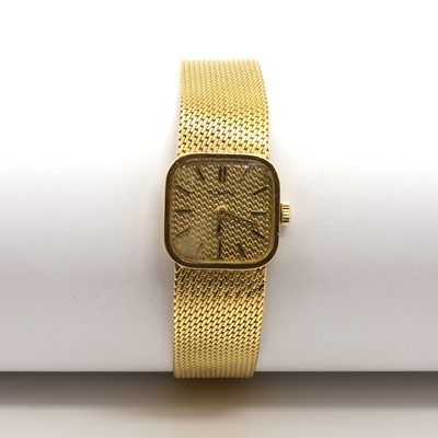 Lot 555 - A ladies' 18ct gold Eterna mechanical bracelet watch