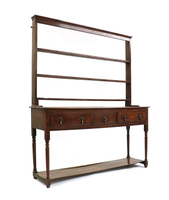 Lot 340 - A George III oak dresser