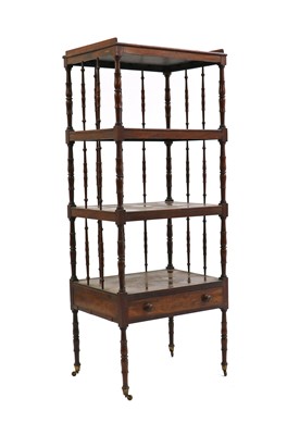 Lot 325 - A Regency rosewood whatnot