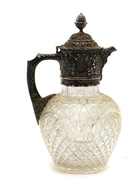 Lot 3 - A late Victorian silver mounted cut glass claret jug