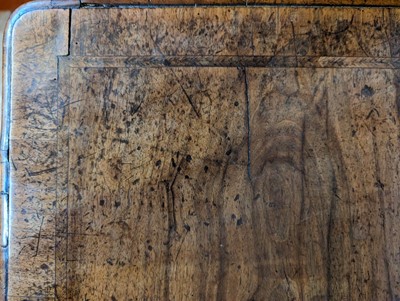 Lot 34 - A George II walnut and feather-banded kneehole desk