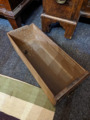 Lot 34 - A George II walnut and feather-banded kneehole desk